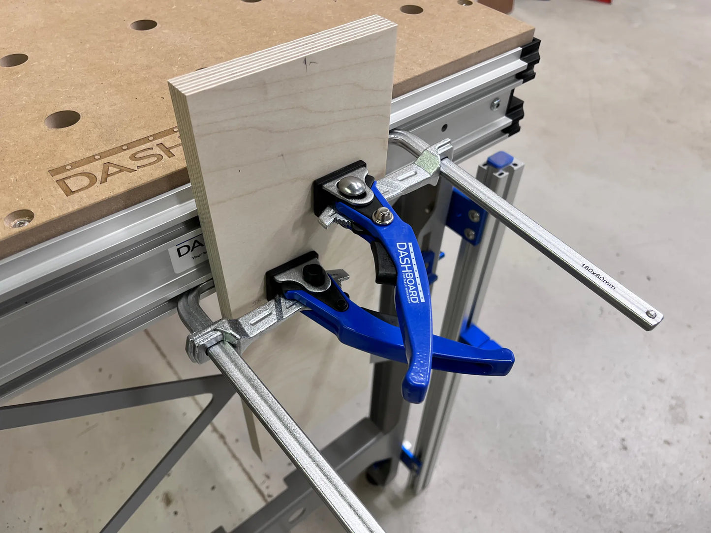 Dash-Board Track Clamp
